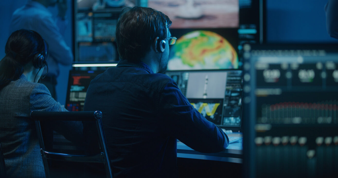 Flight Control Operators Clap Hands After Space Rocket Launch
